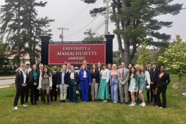 students on a trip to America standing together